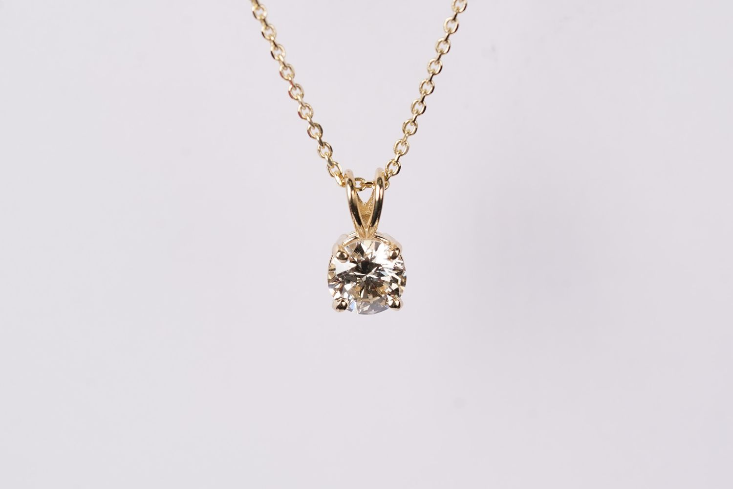 EATX- 14KY 2.44g .70ct K/SI2 Diamond Solitaire Pendant 16-18&quot;
