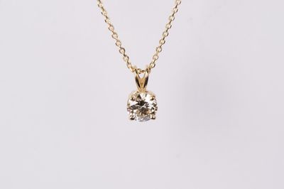 EATX- 14KY 2.44g .70ct K/SI2 Diamond Solitaire Pendant 16-18&quot;