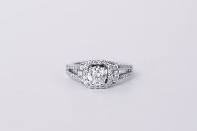 14KW 4.45g 1.40TW (.64ctr) H/SI1 Round Leo Diamond Halo Engagement Ring (size 5)