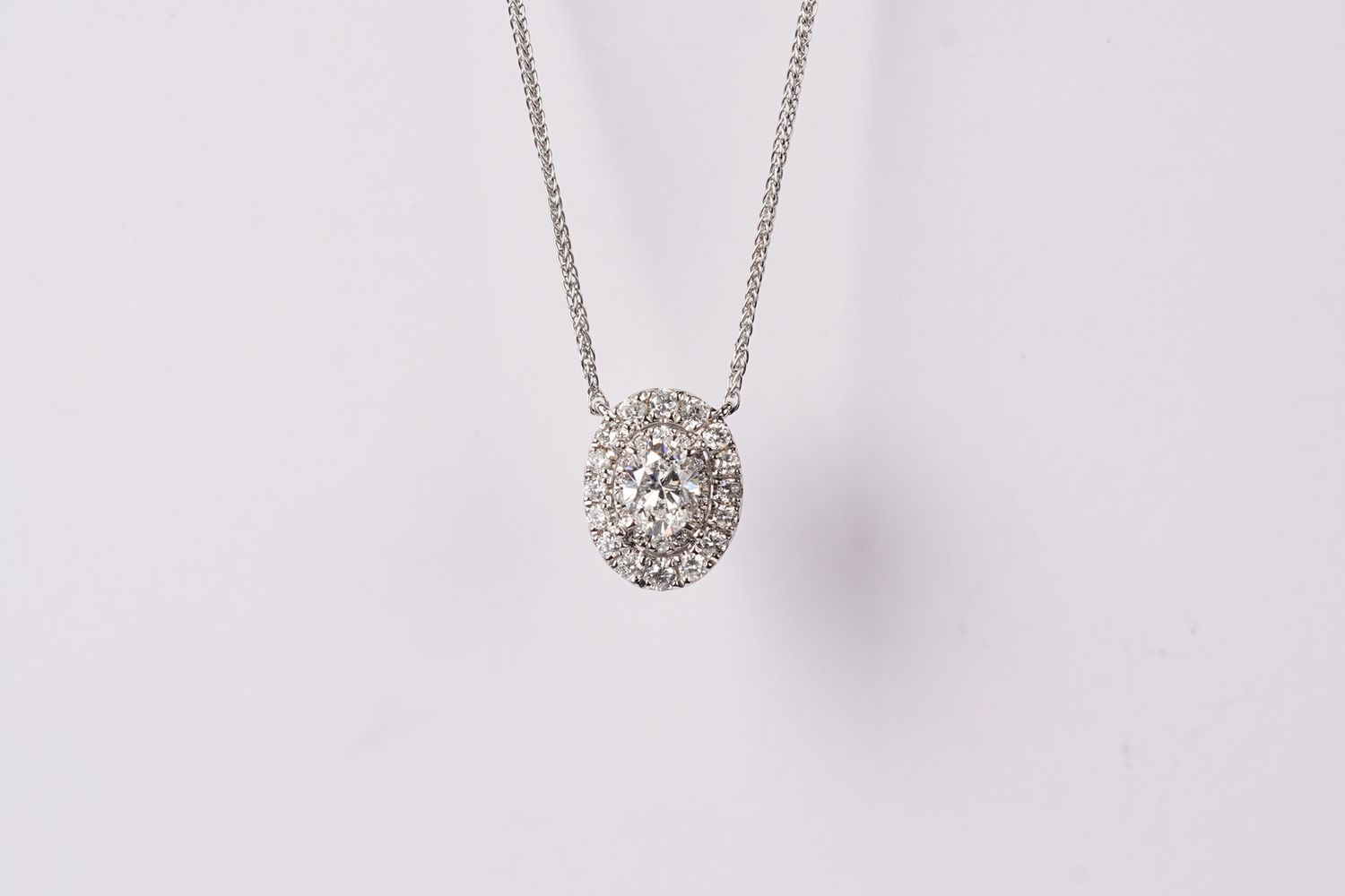 RBLX- 14KW 2.20g .50ctw (.33ctr) Oval Diamond Halo Fashion Pendant 18&quot;