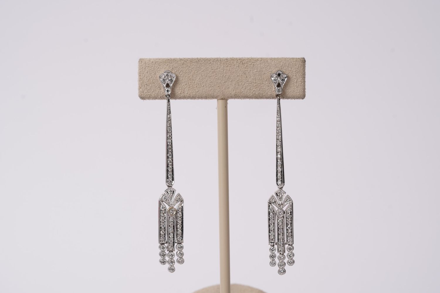 RTTX- 18KW 5.95g .60ctw Diamond Dangle Fashion Earrings
