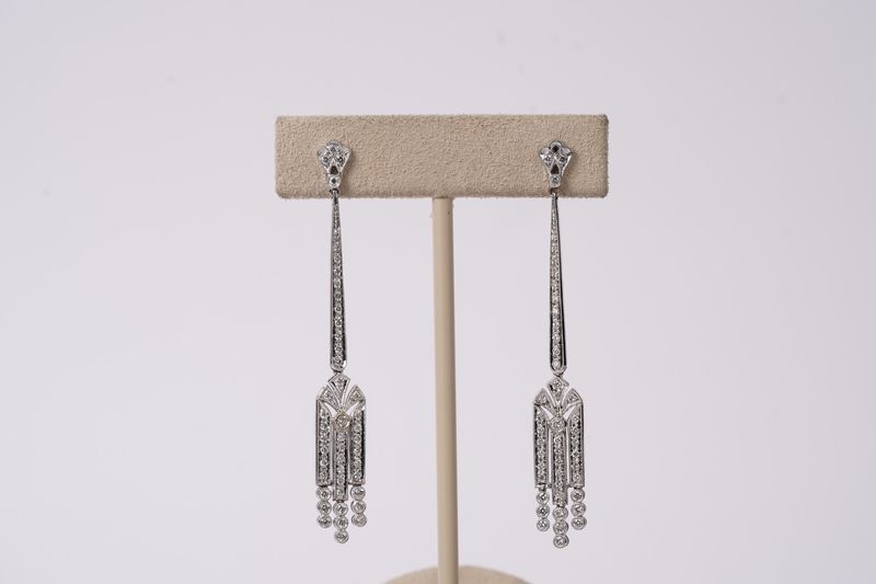 RTTX- 18KW 5.95g .60ctw Diamond Dangle Fashion Earrings