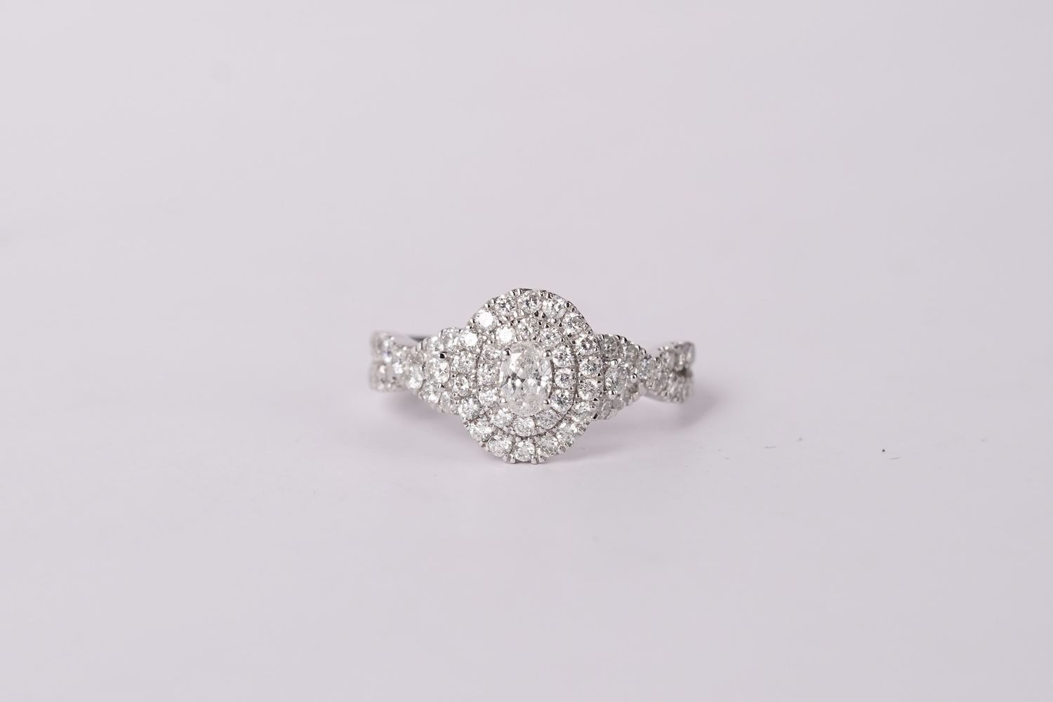 DATX-10KW 3.3g 1.00ctw Oval Diamond Double Halo Ring (size 7)