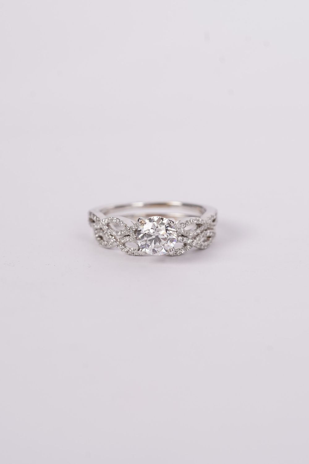 ARTT- 18KW 4.10g 1.40ctw (.90ctr) Diamond Twist Engagement Ring (size 6)