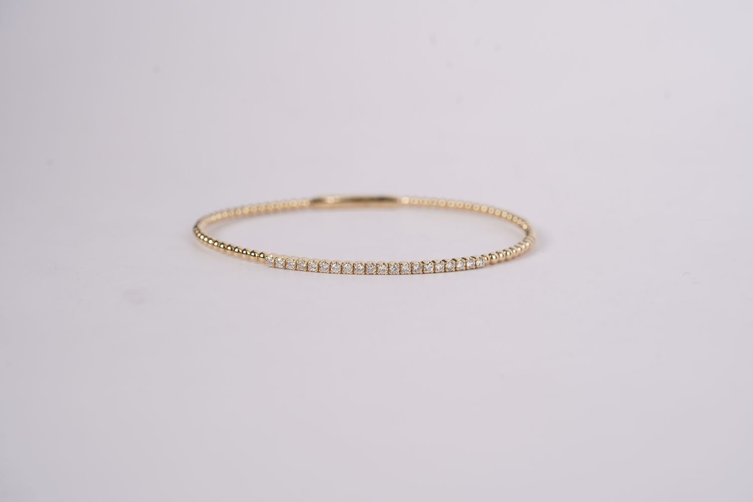 RDTX- 14KY 5.27g .44ctw Diamond Flex Bangle Bracelet