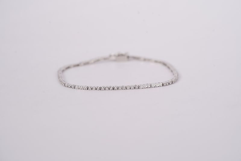 BTTX- 18KW 5.79g 1.00ctw Diamond Tennis Bracelet 7&quot;