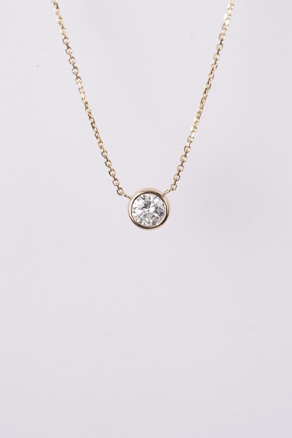 BREX- 14KY 2.76g .90ct I/I1 Round Diamond Bezel 16-18&quot;
