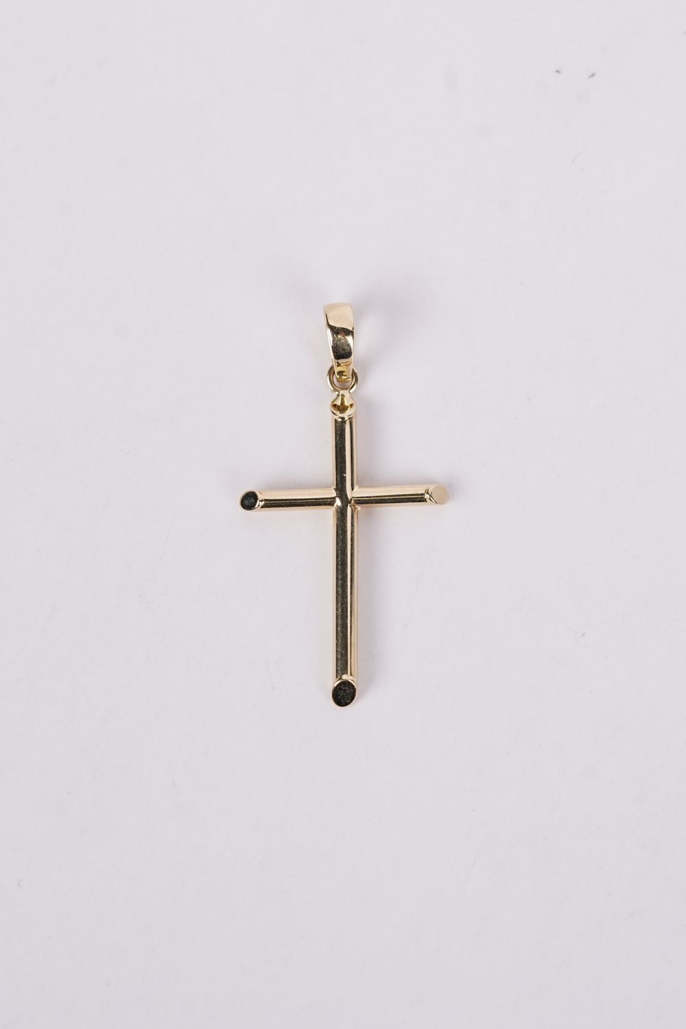 ETX- 14KY .65g Gold Cross