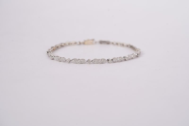 VATT- 18KW 8.45g 1.00ctw Diamond Fashion Tennis Bracelet 7.5&quot;