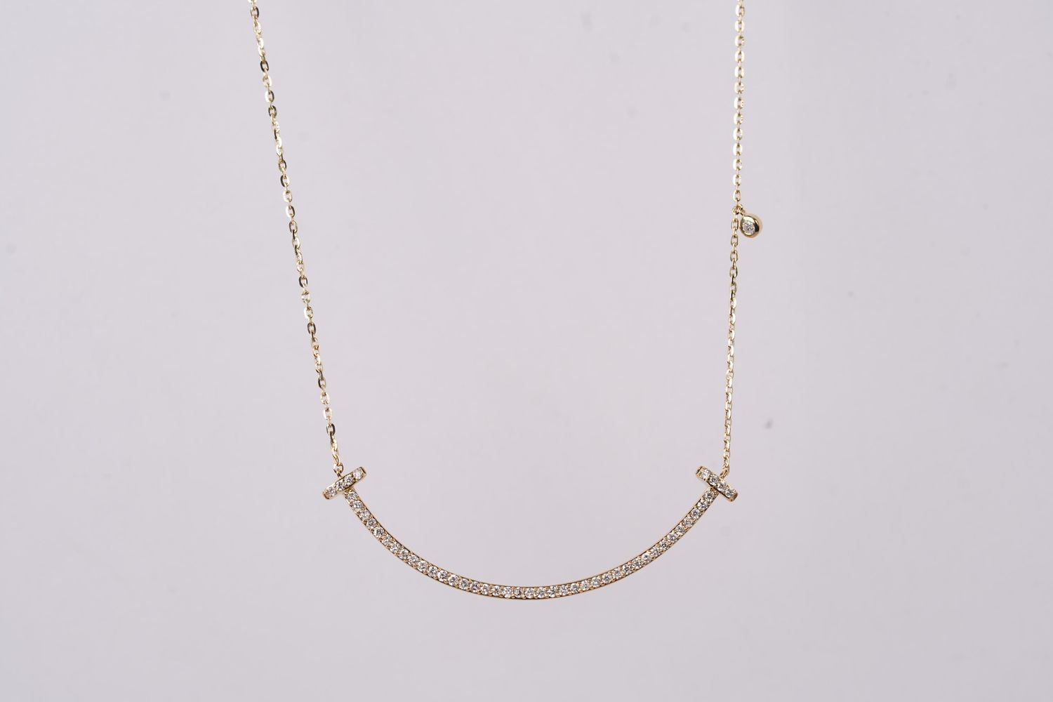 ARI- 14KY 2.00g .26ctw Diamond Curved Bar Necklace 16-18&quot;