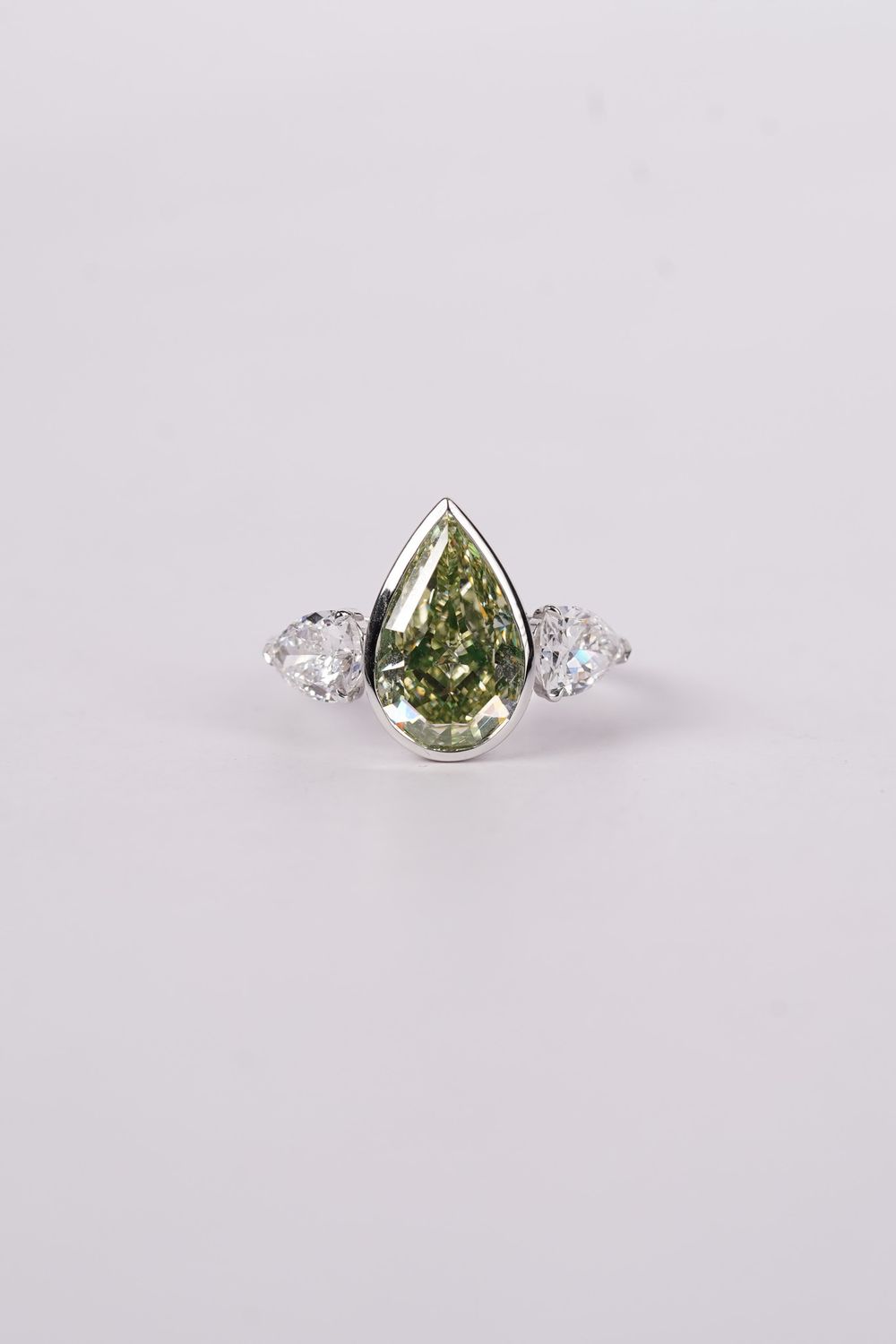 DETPT- 18KW 5.94g 6.12ctw (4.48ctr) FLGY/SI1 GIA Pear Diamond Engagement Ring (size 7)