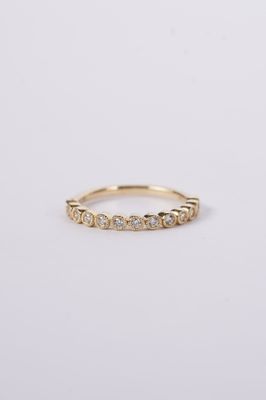 NTT- 14KY 2.2g .20ctw Diamond Milgrain Bezel Stackable Band (size 7)