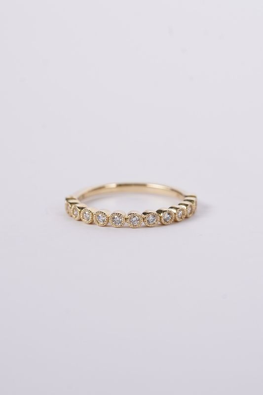 NTT- 14KY 2.2g .20ctw Diamond Milgrain Bezel Stackable Band (size 7)