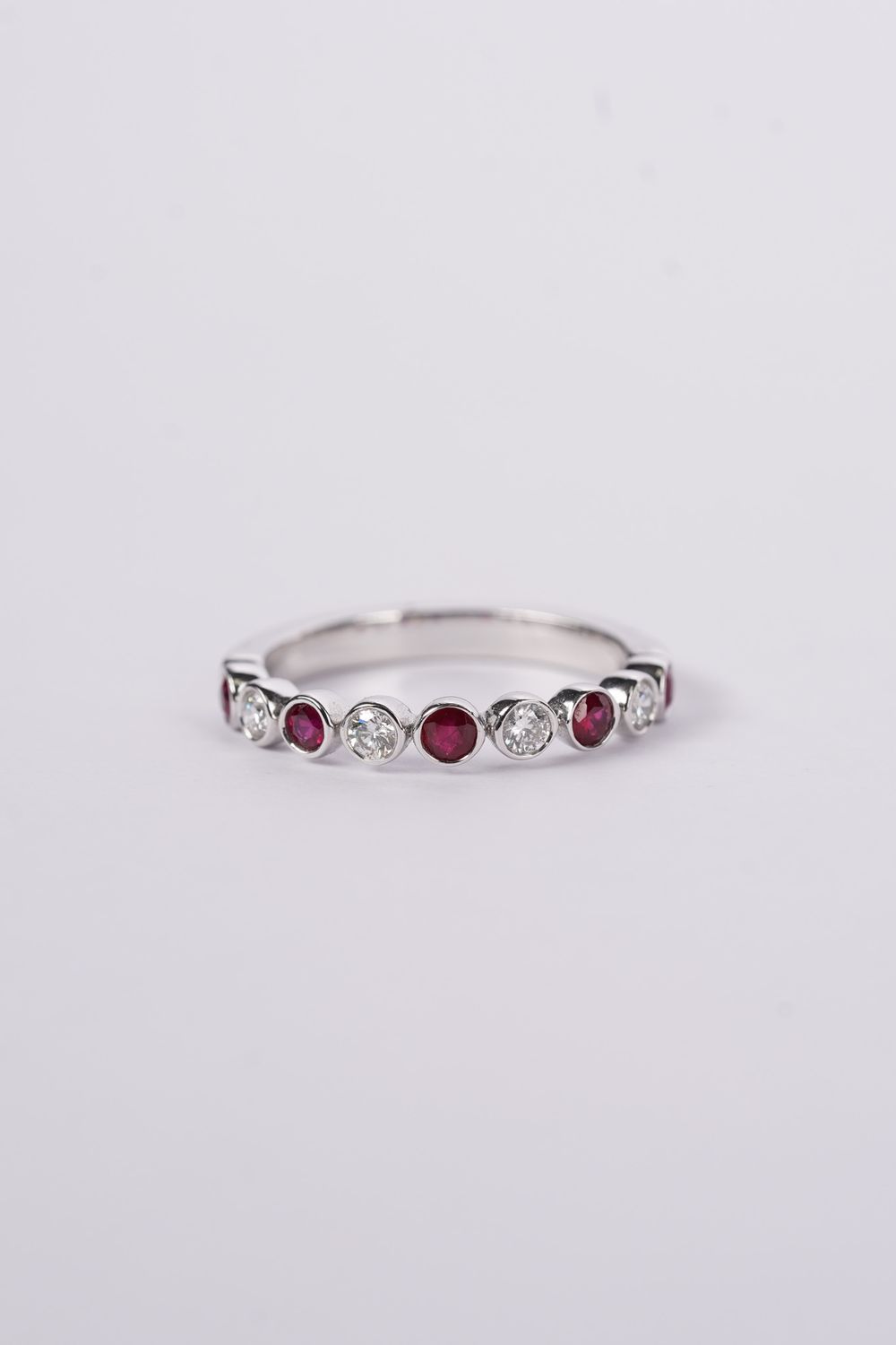 NVT-14KW 3.1g .22ctw Diamond .36ctw Ruby Stackable Ring (size 7)