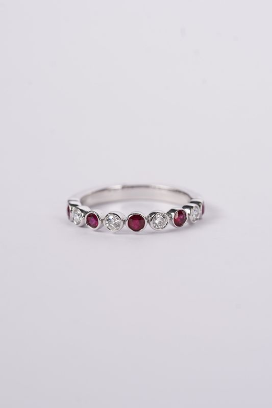 NVT-14KW 3.1g .22ctw Diamond .36ctw Ruby Stackable Ring (size 7)