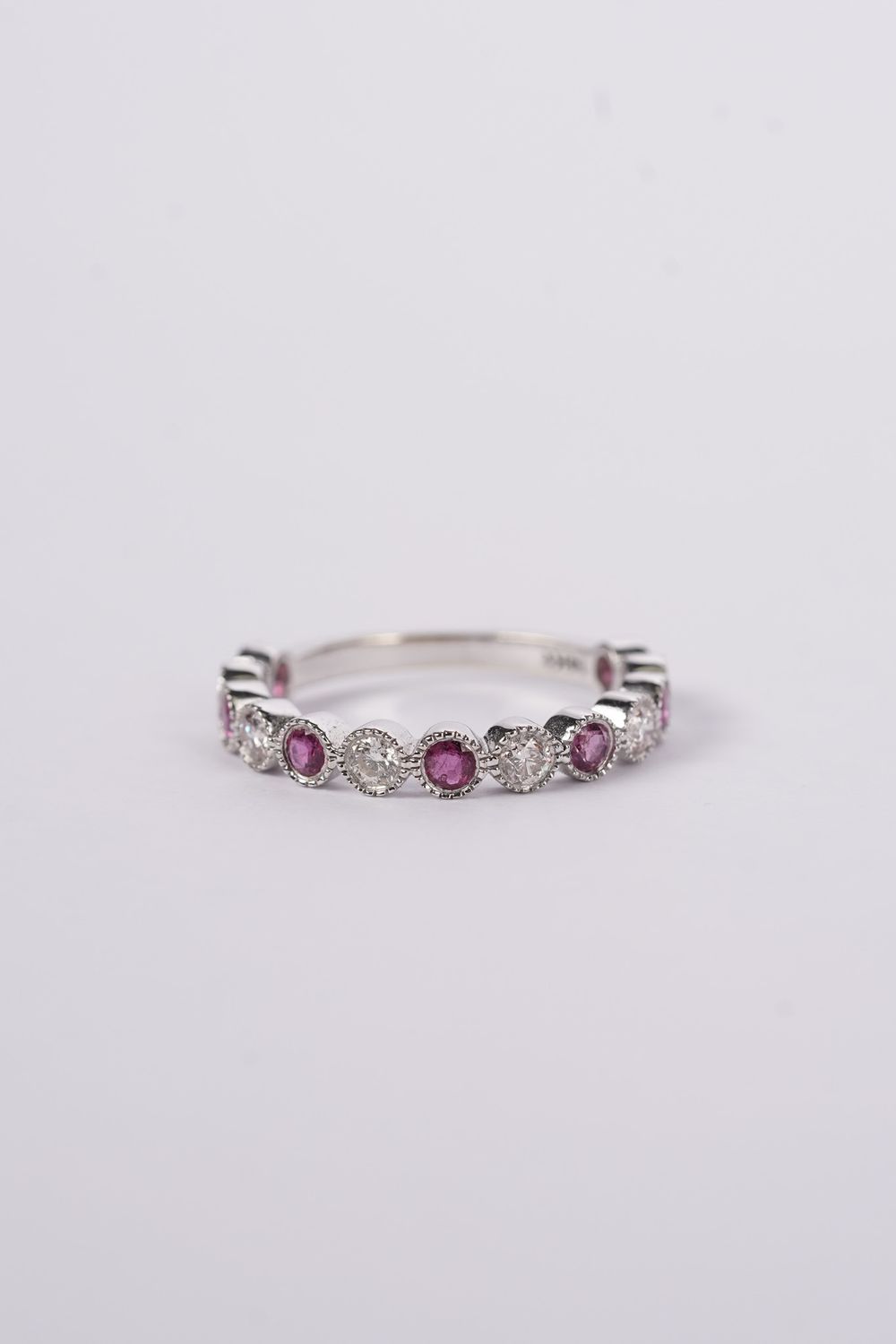 14KW 2.2g .38tw Diamond .50tw Ruby Stackable Band (size 7)