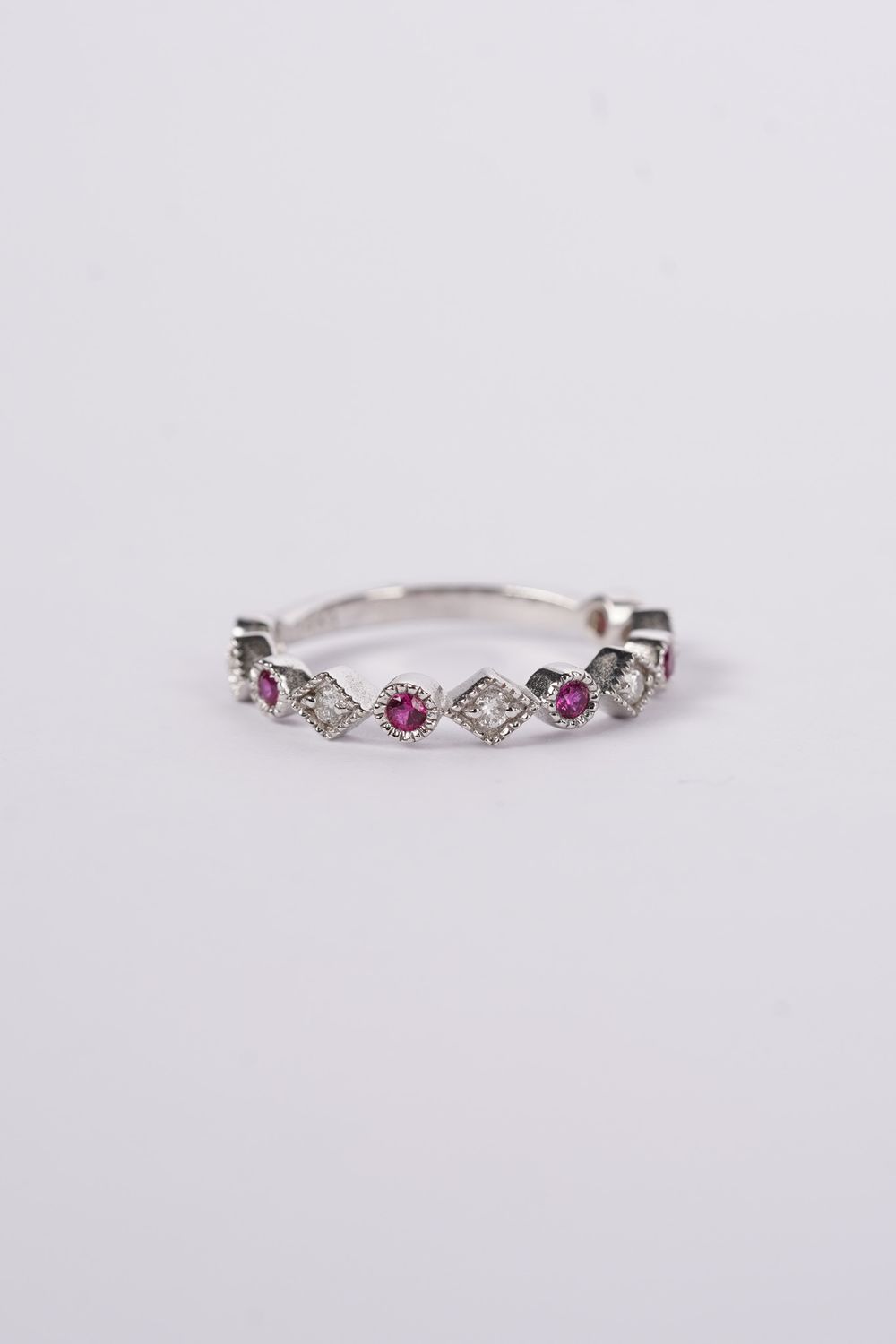 14KW 2.3g 2.4g .14ctw Diamond .22ctw Ruby Stackable Band (size 7)
