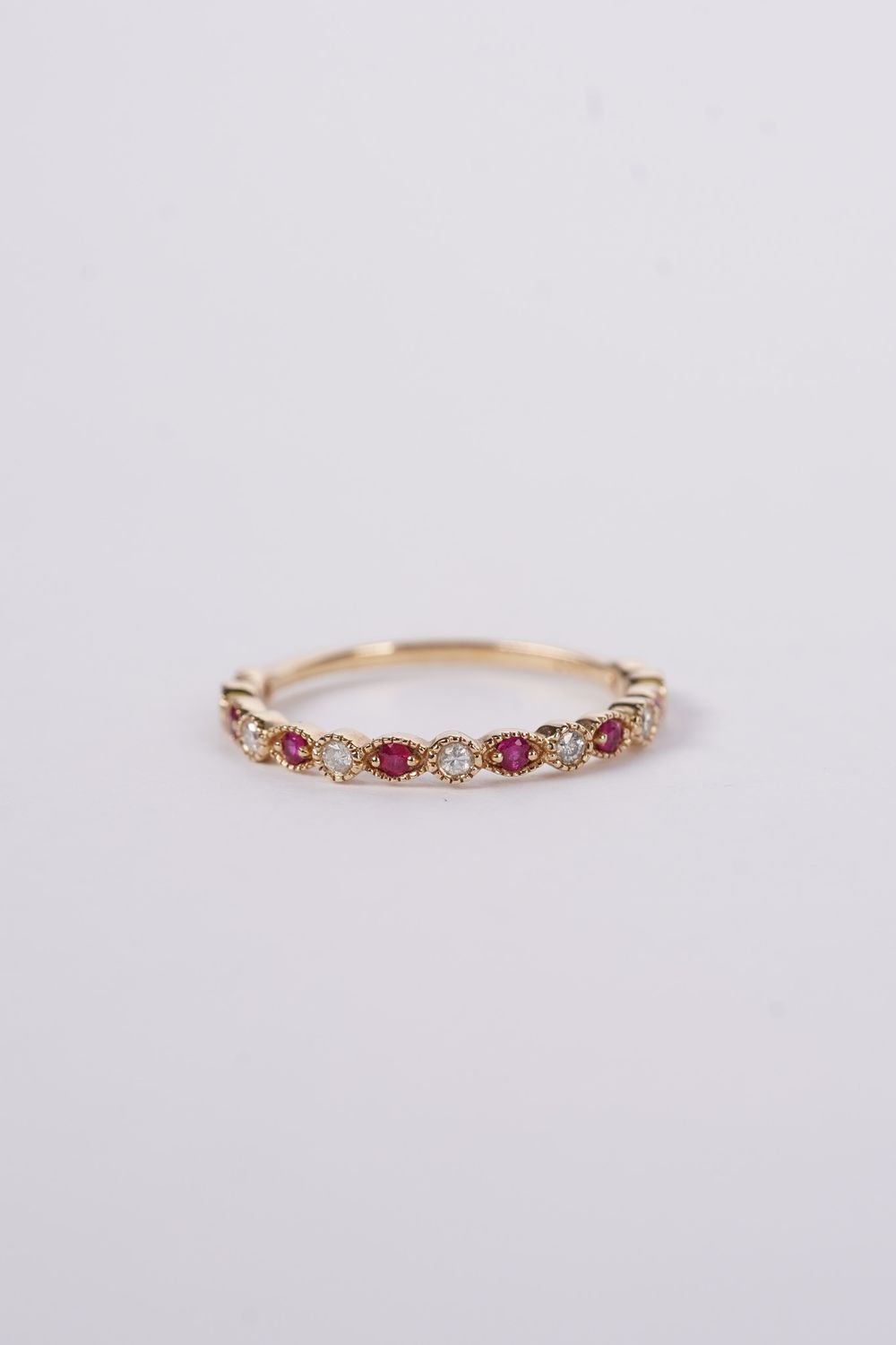 VVI- 14KY 1.47g .12ctw Diamond .16ctw Ruby Stackable Band (size 7.25)