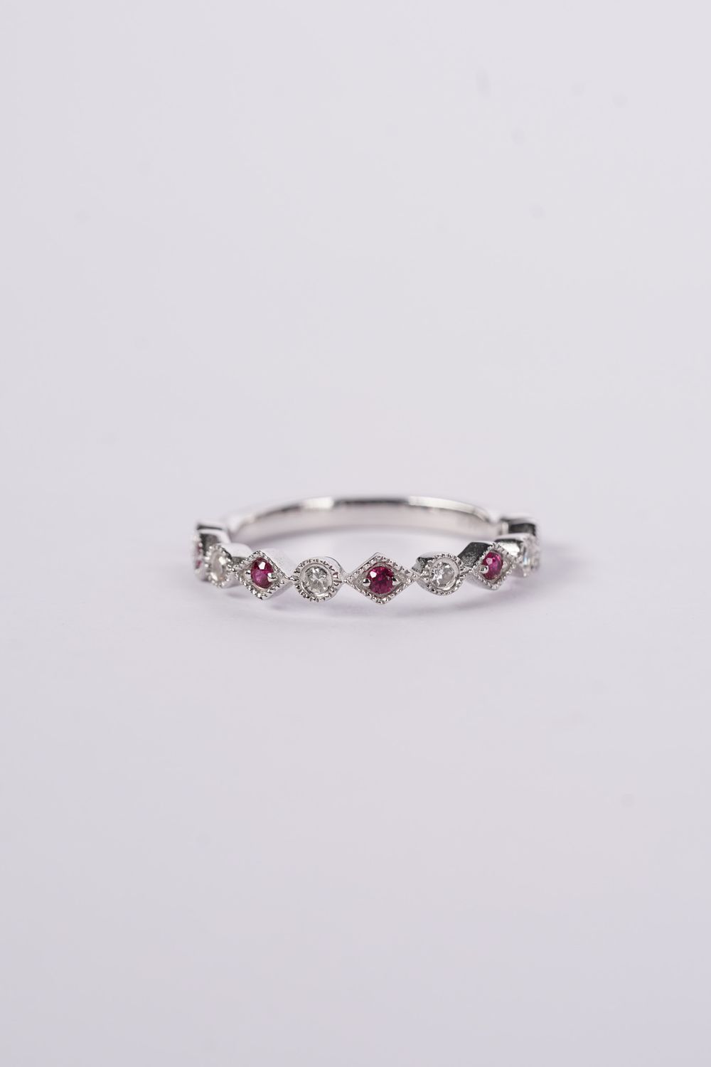 VIN-14KW 2.3g .12ctw Diamond .12ctw Ruby Stackable Band (size 7)
