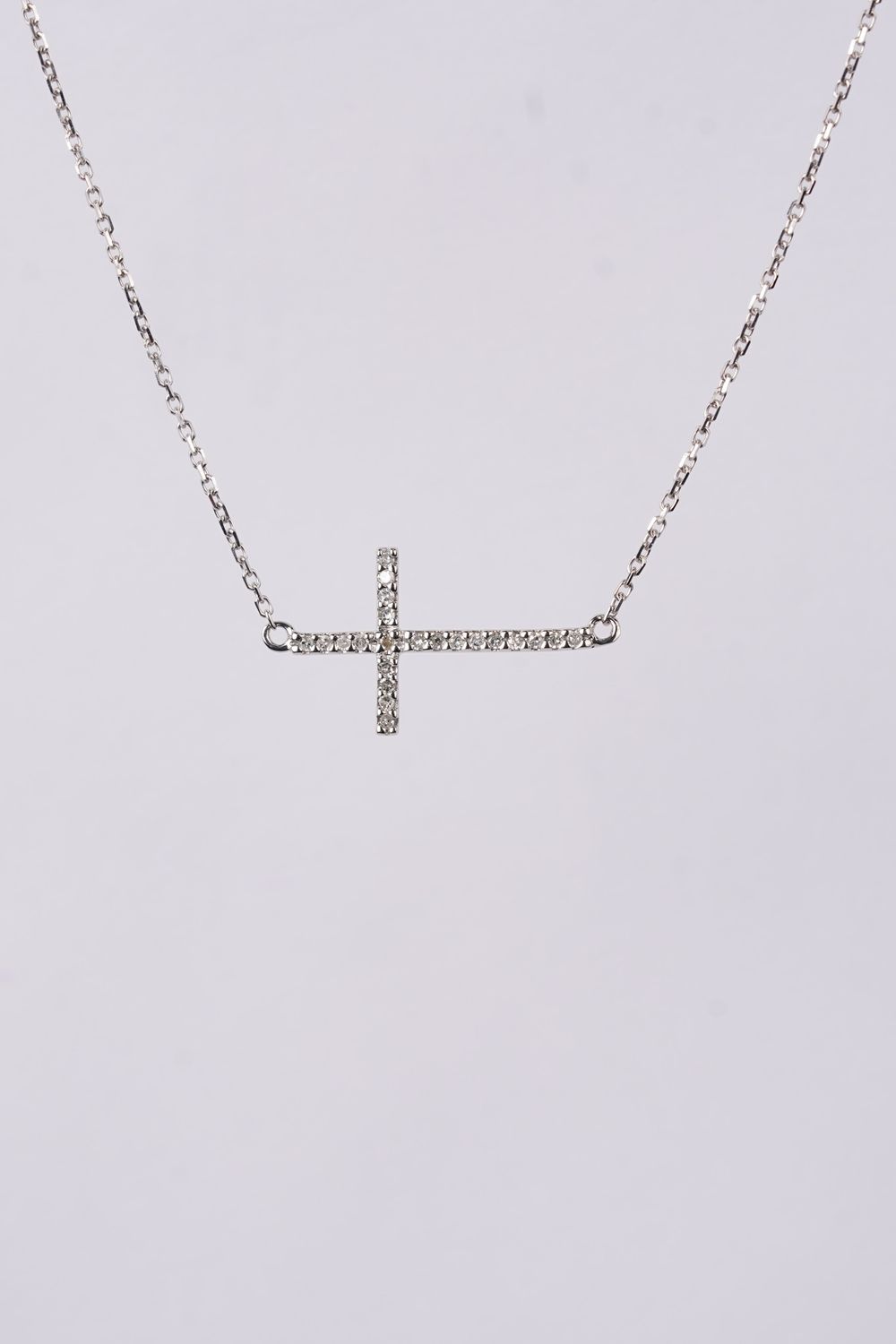 ADE- 14KW 1.80g .09ctw Diamond Sideways Cross Necklace 16-18&quot;
