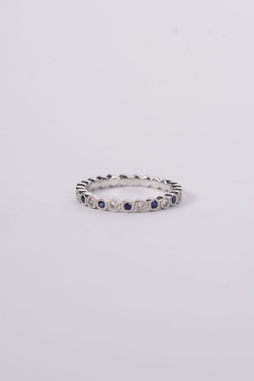 DRTX- 14KW 2.5g .11ctw Diamond .13ctw Sapphire Stackable Band (size 6.5)