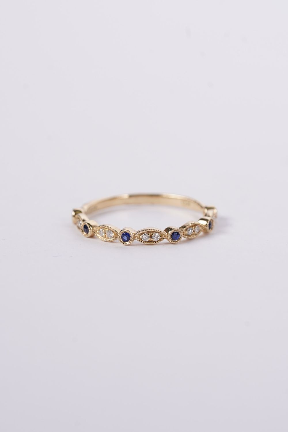 VRT-14KY 1.3g .10ctw Diamond .12ctw Sapphire Stackable Band (size 7)