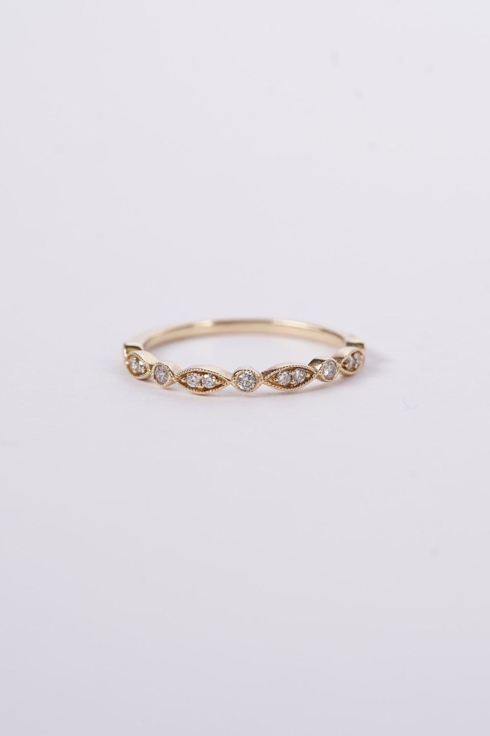ADE- 14KY 1.5g .18ctw Round Diamond Stackable Band (size 7)