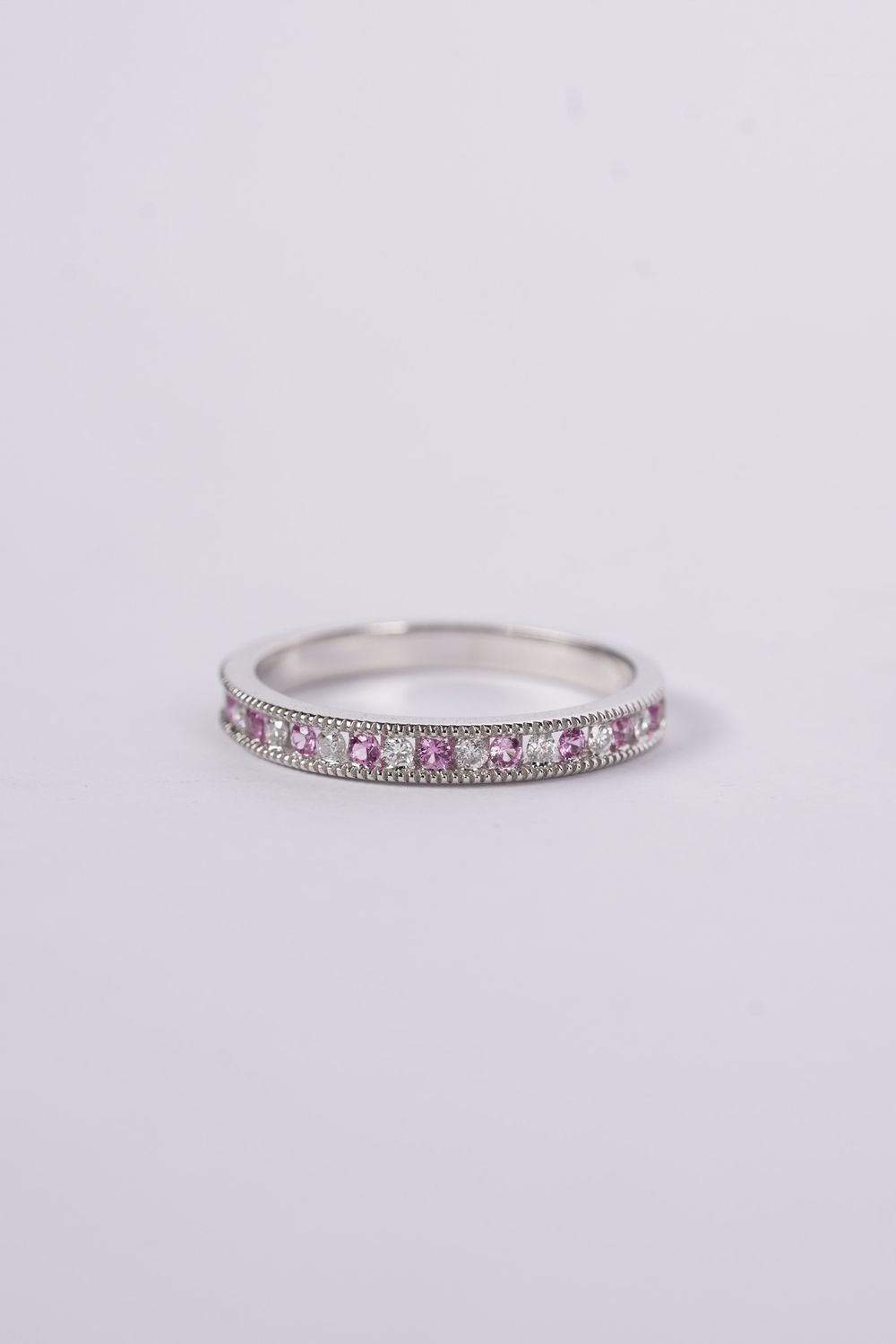 ARN- 14KW 2.2g .16ctw Diamond .20ctw Sapphire Stackable Band (size 7)