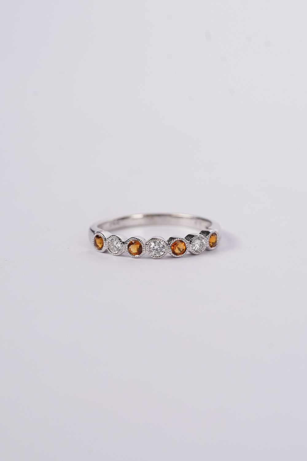 DRA- 14KW 1.8g .22ctw Diamond .25ctw Sapphire Stackable Band (size 6)