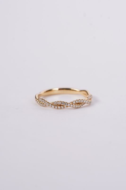 NAI 18KY 2.07g .18ctw Diamond Twist Stackable Band (size 6.75)