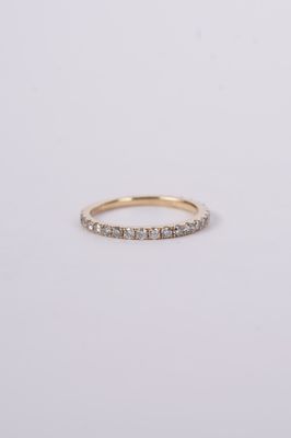 14KY 1.9g .60tw Diamond Shared Prong Stackable Band (size 7.25)