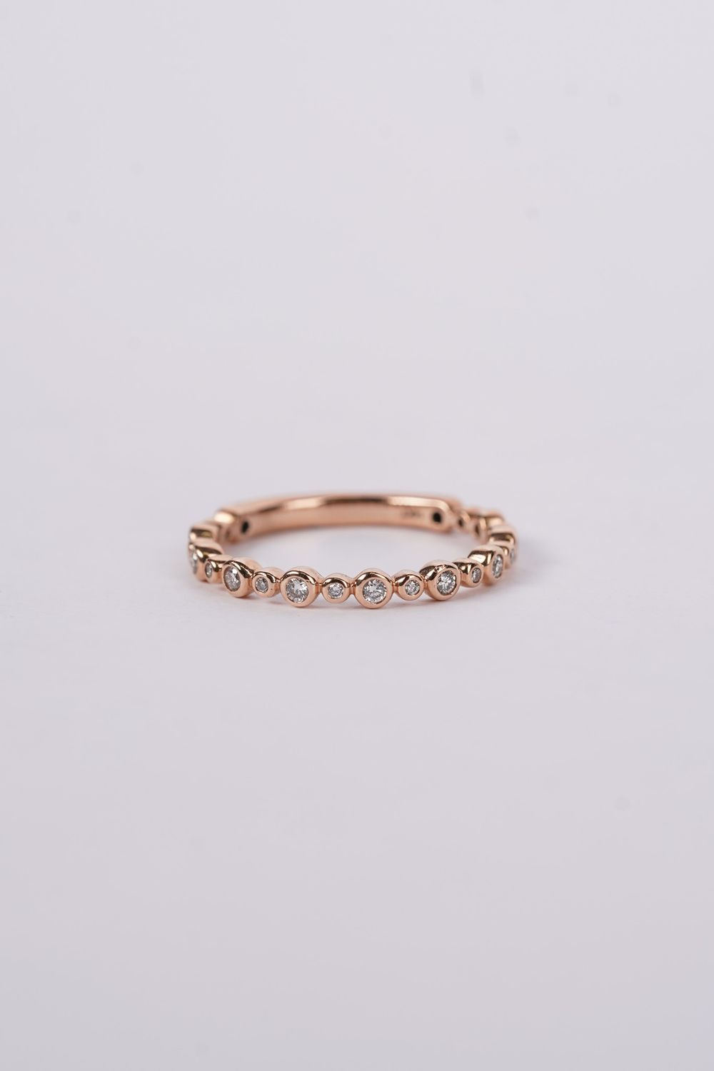 14KR 2.0g .25ctw Diamond Bezel Stackable Band (size 7)