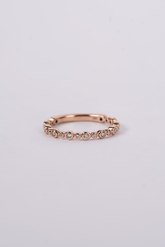14KR 2.0g .25ctw Diamond Bezel Stackable Band (size 7)