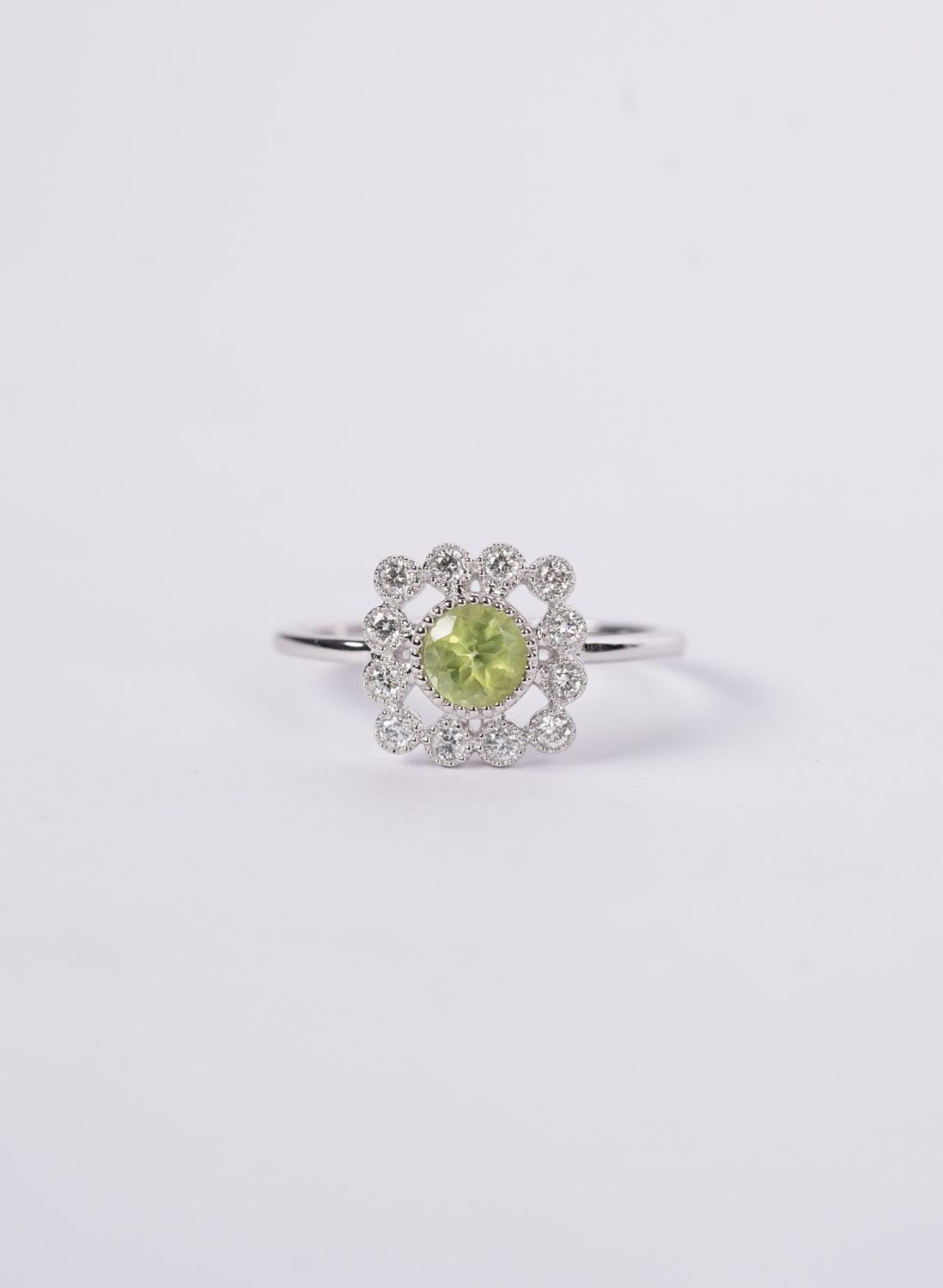 NNR- 14KW 2.37g .69ctw Peridot &amp; Diamond Halo Ring (size 7)