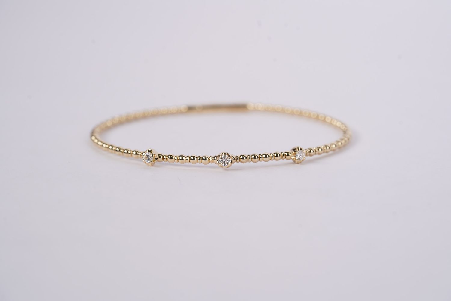 RDTX- 14KY 5.57g .22ctw Diamond Flex Bangle Bracelet