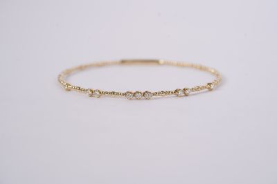 BTTX- 14KY 5.20g .32ctw Diamond Flex Bangle Bracelet