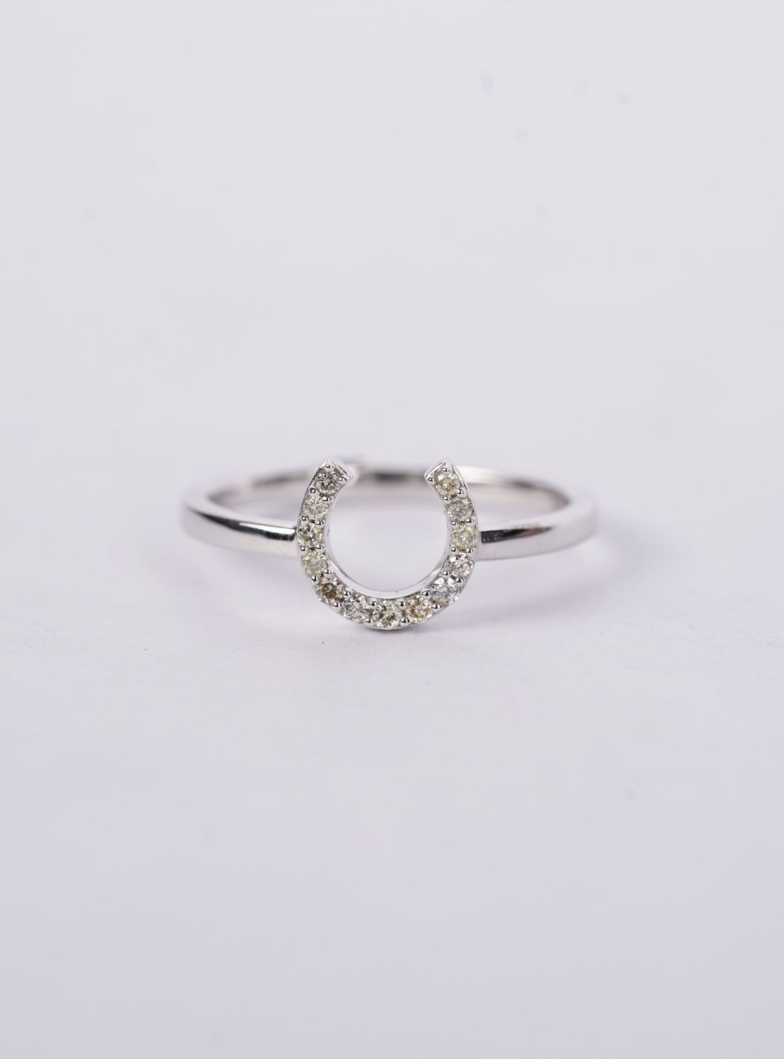 NENX- 14KW .11ctw Diamond Horseshoe Ring (size 7)