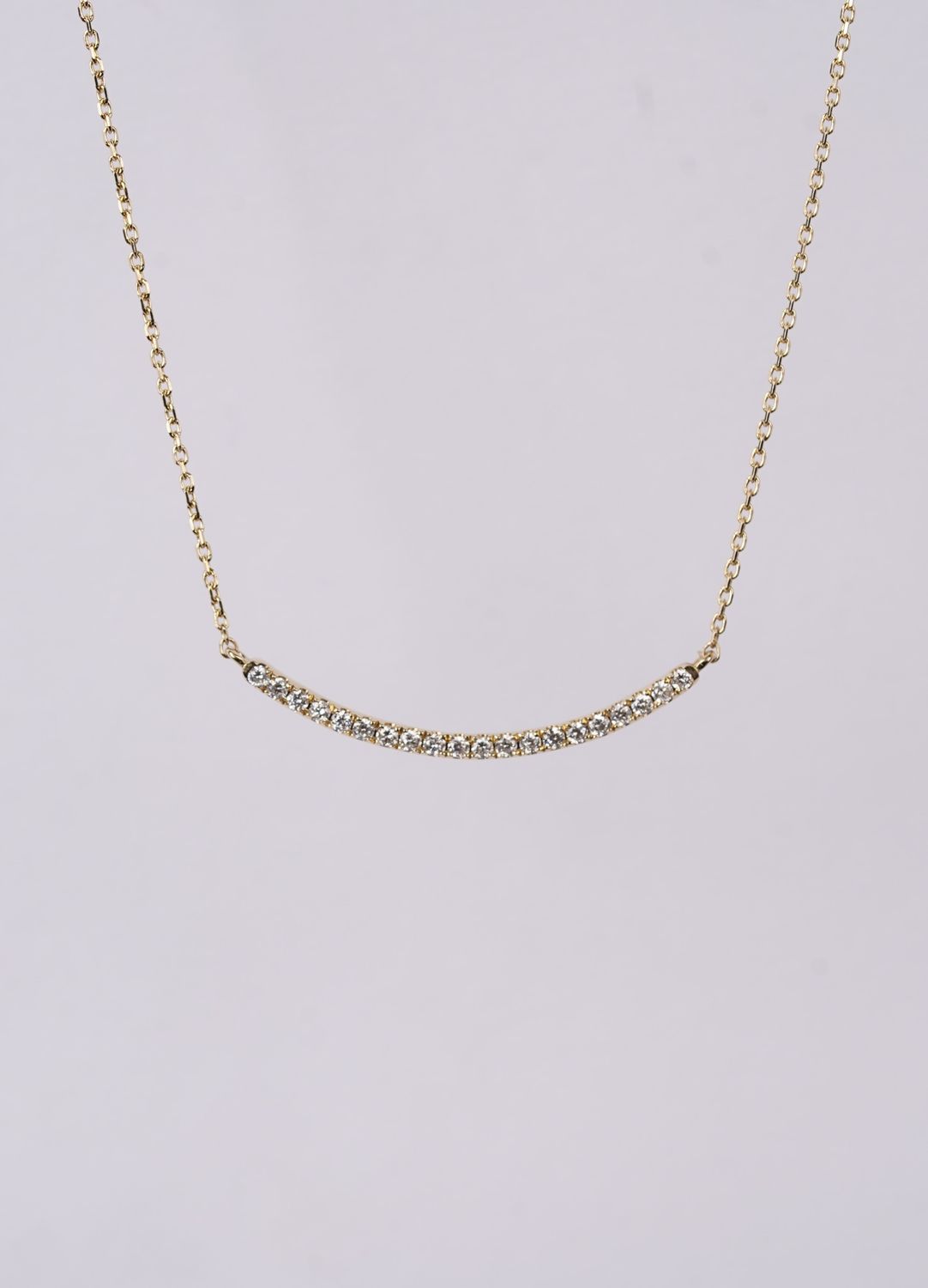 NIEX- 14KY 1.53g .15ctw Diamond Curved Bar Necklace 16-18&quot;
