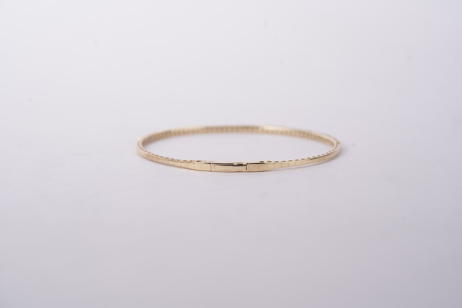 IDLX- 14KY 5.46g .85ctw Diamond Flex Bangle