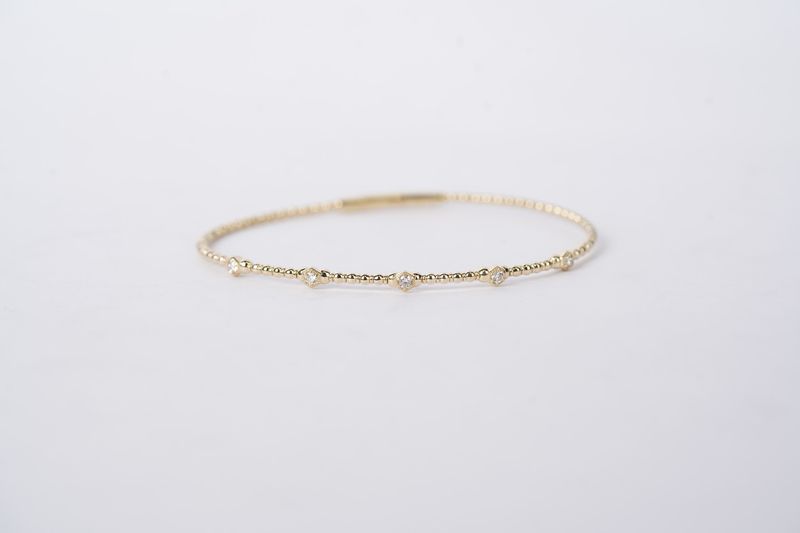 RTTX- 14KY 4.86g .18ctw Diamond Flex Bangle
