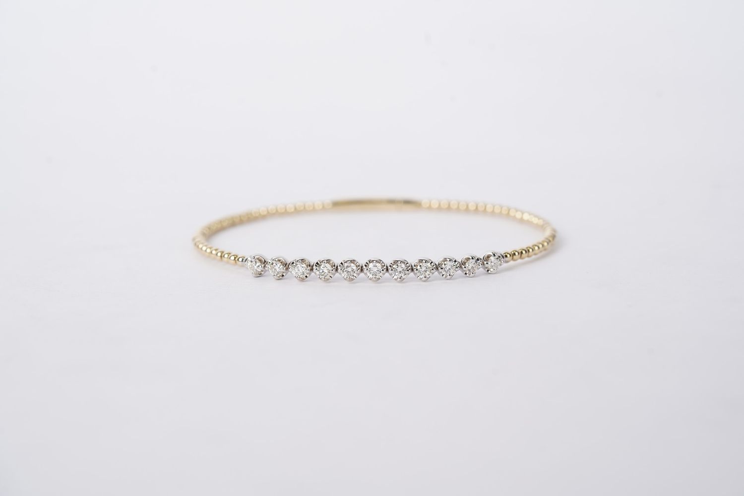 VVBT- 14KWY 6.76g .88ctw Diamond Flex Bangle