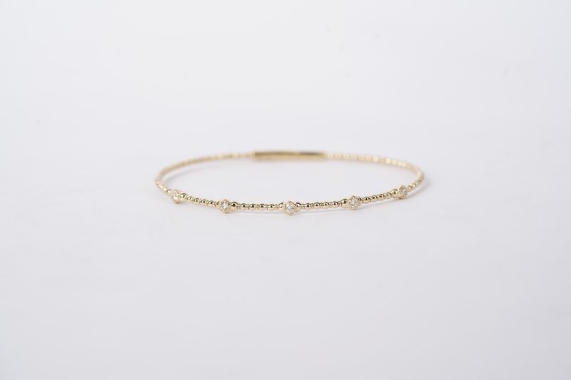 RTTX- 14KY 4.70g .18ctw Diamond Flex Bangle