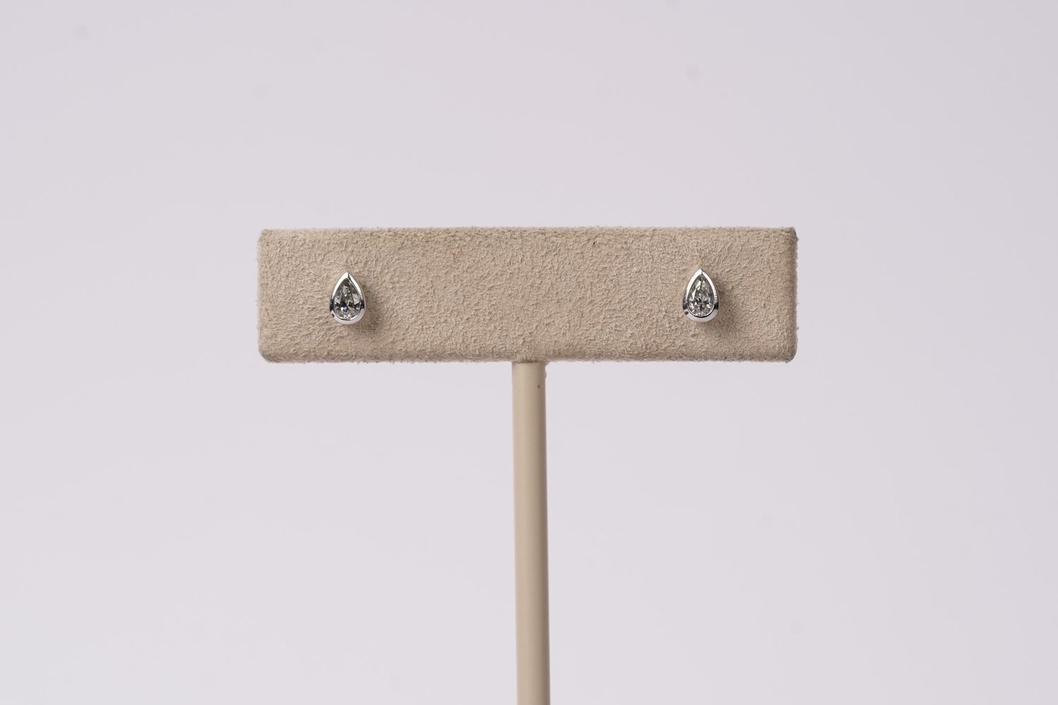 VRL- 14KW .16ctw Pear Diamond Bezel Stud Earrings