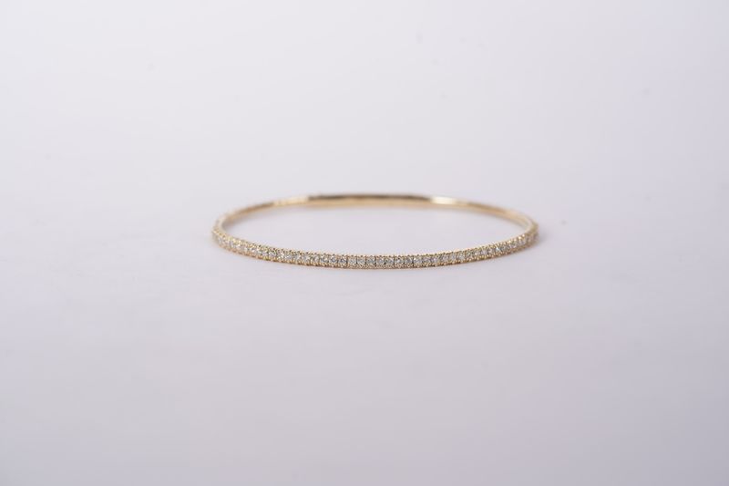 IDLX- 14KY 5.46g .85ctw Diamond Flex Bangle