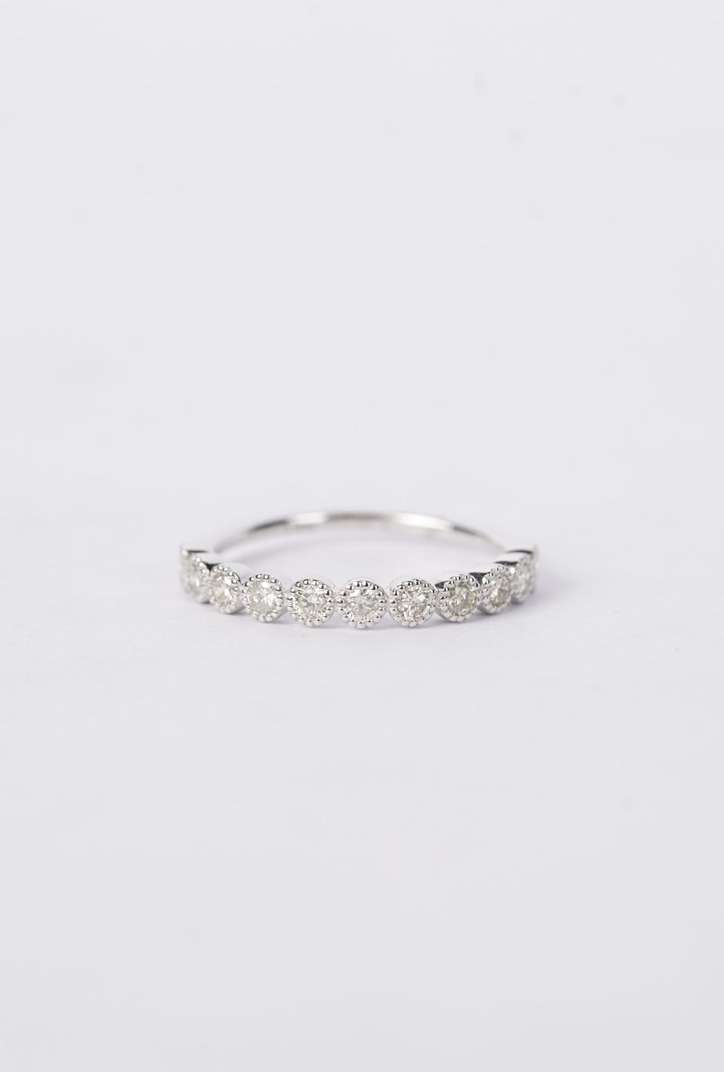 14KW 1.51g .38ctw Diamond Bezel Milgrain Stackable Band (size 7)