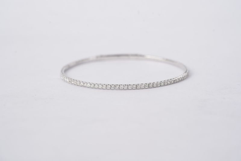 LNTX- 14KW 5.21g .85ctw Diamond Flex Bangle Bracelet