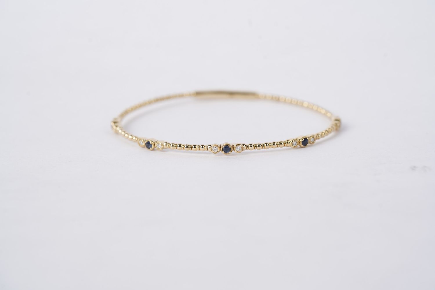 LATX- 14KY 5.11g .45ctw Sapphire &amp; Diamond Flex Bangle Bracelet