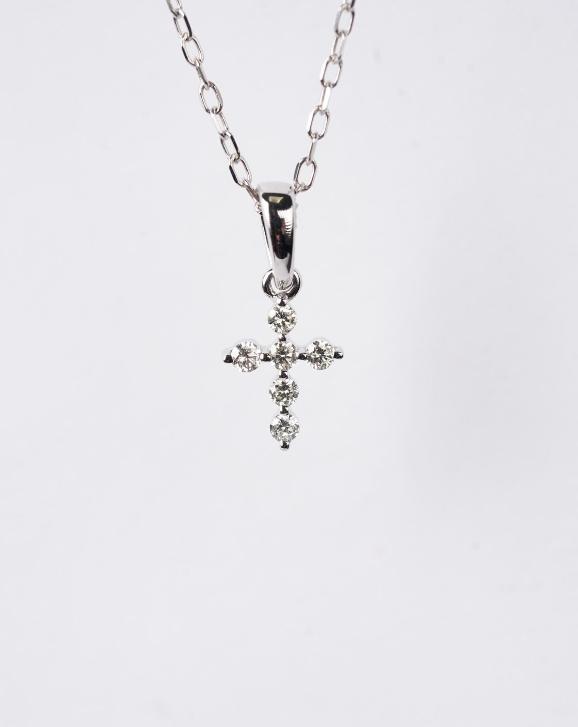ARE- 14KW 1.33g .09ctw Petite Diamond Cross Necklace 18"