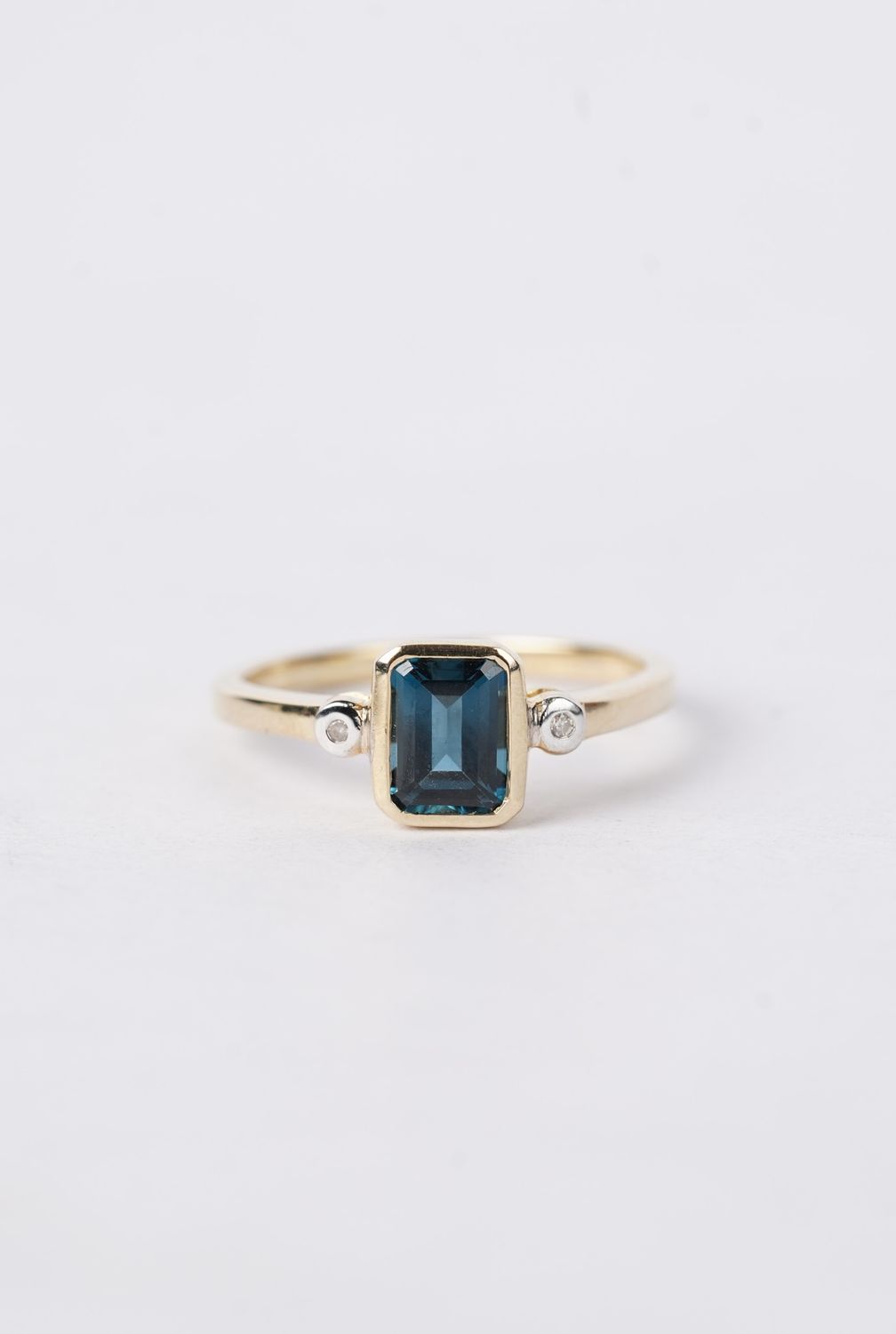 1.32 Carat London Blue Topaz and Diamond 3 Stone Bezel-Set Ring in 10k Yellow Gold