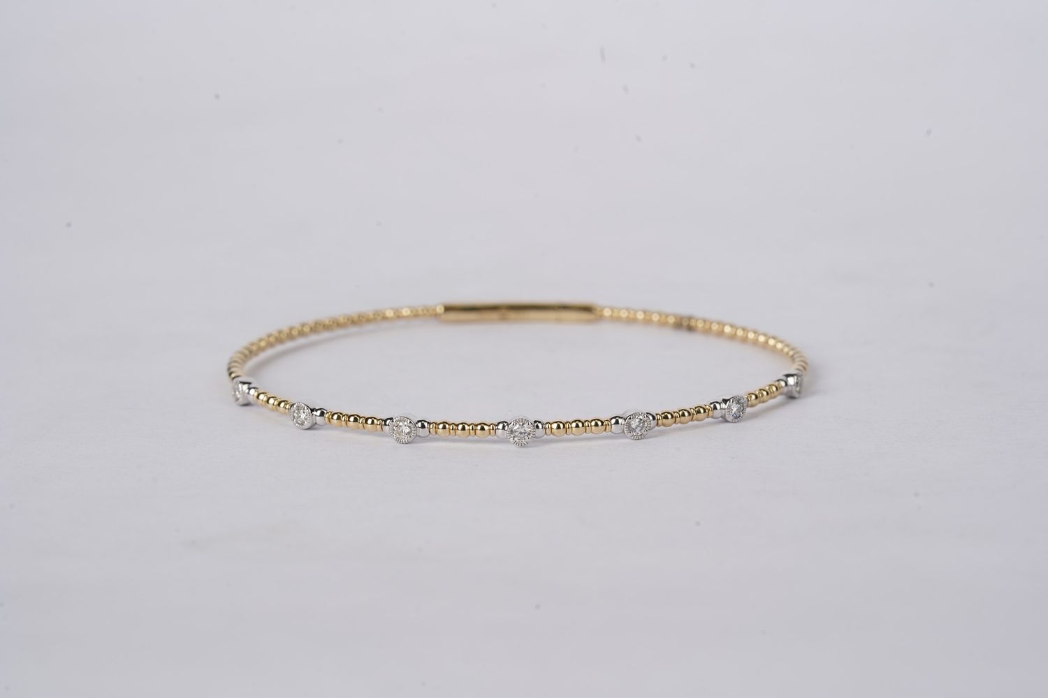 Two Tone Diamond Beaded Flex Bangle Bracelet in 14k White and Yellow Gold